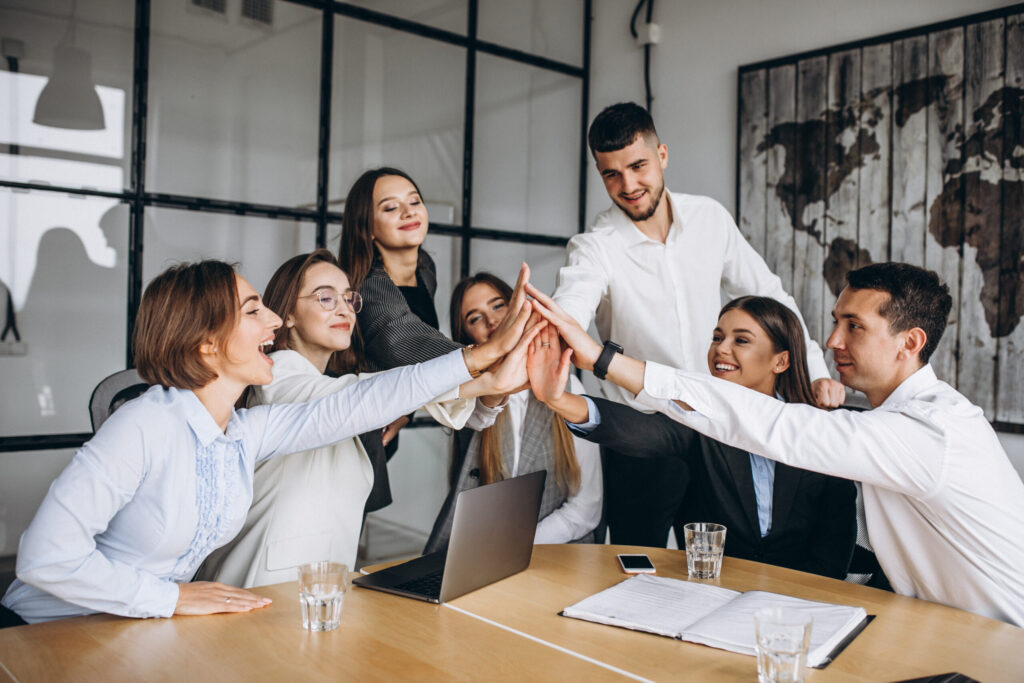 group of people working out business plan in an office